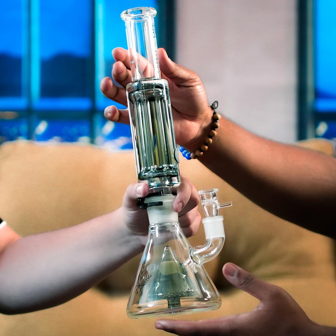 User lighting Freeze Pipe Bong Pro for smooth, cooled draw