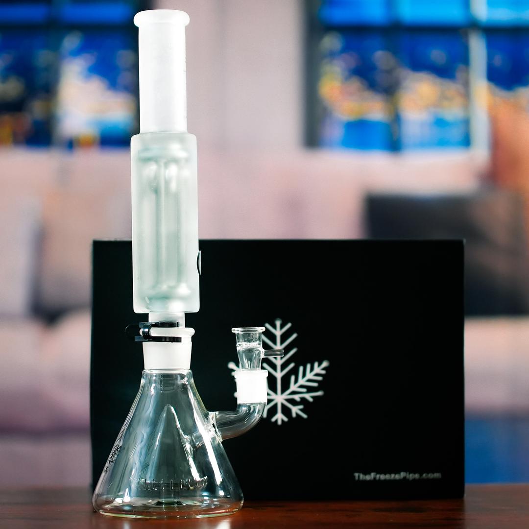 Freeze Pipe Bong Pro with packaging, featuring glass beaker base and glycerin coil design