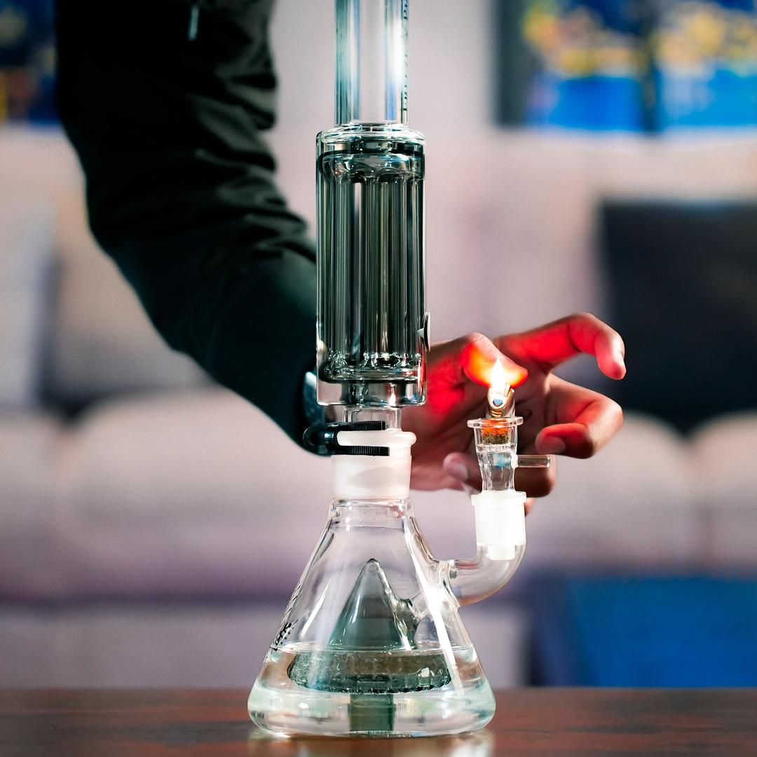 Person assembling Freeze Pipe Bong Pro, attaching freezable glycerin coil