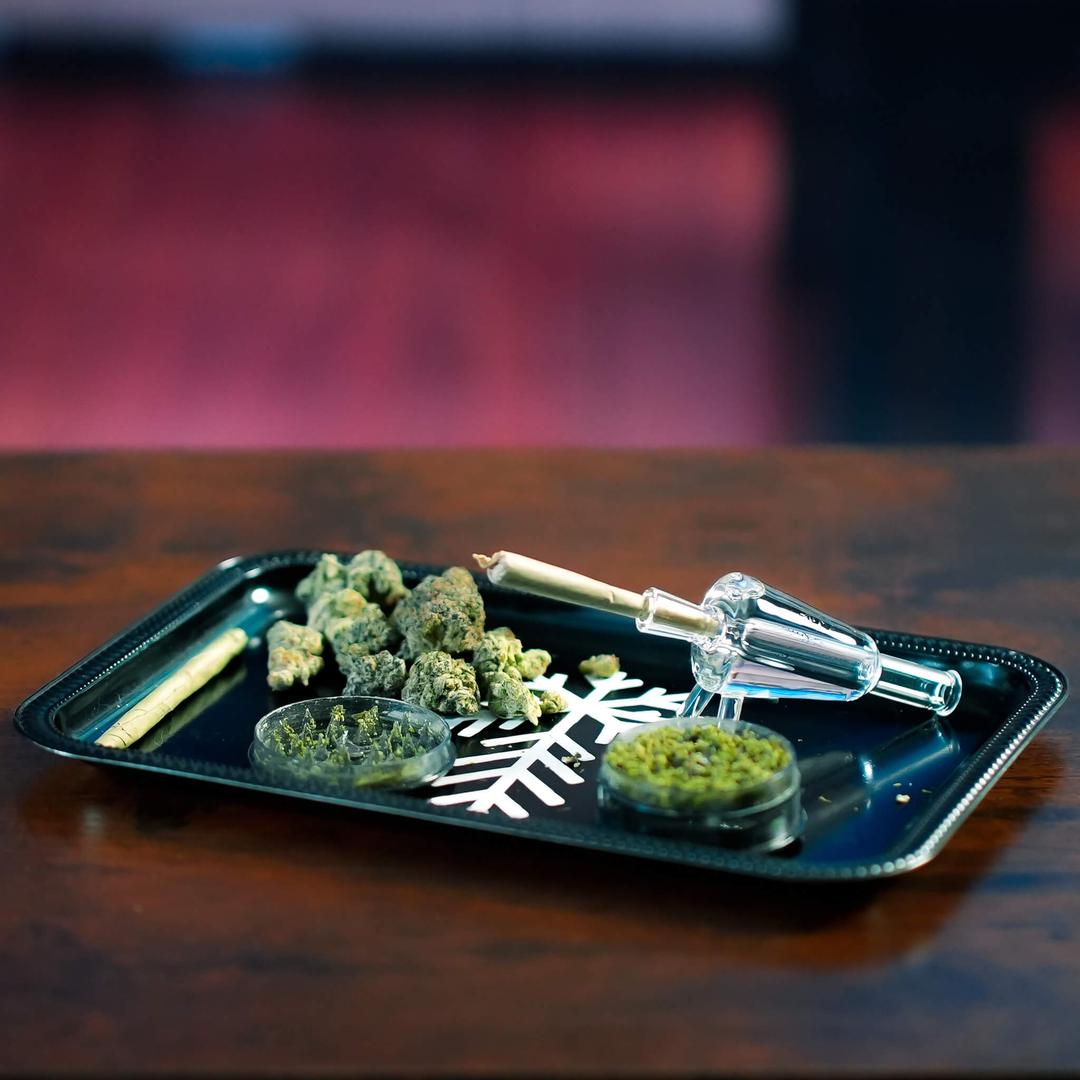 Close-up of Freeze Pipe Joint Chiller on tray — clean glass design with frozen glycerin core