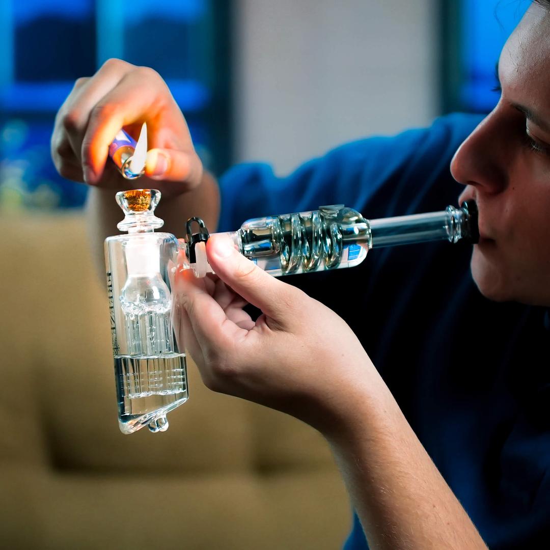 Person using Freeze Pipe Bubbler — Ice-Cold, Smoother Smoke from Glycerin Cooling