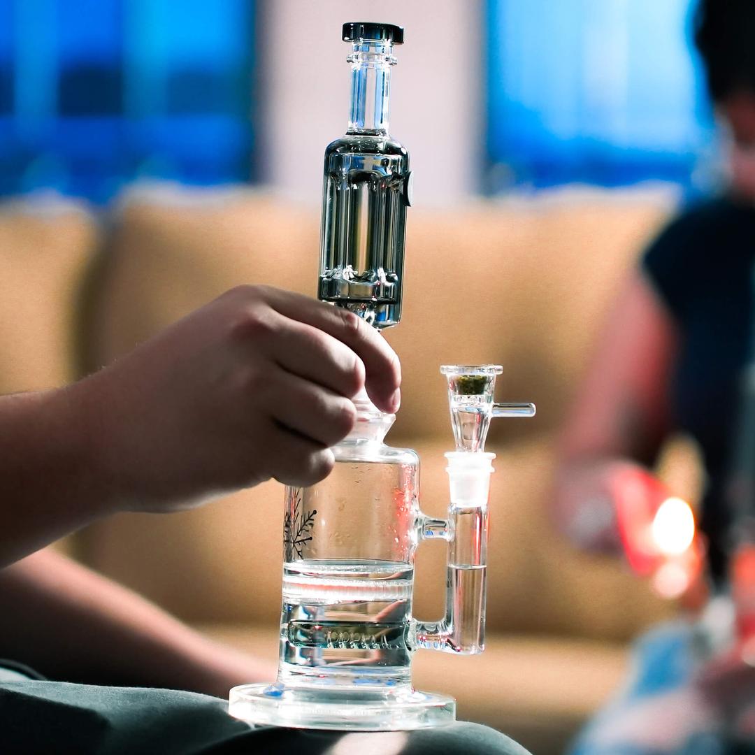 User preparing Freeze Pipe Mini Bong during session for ice-cold draws