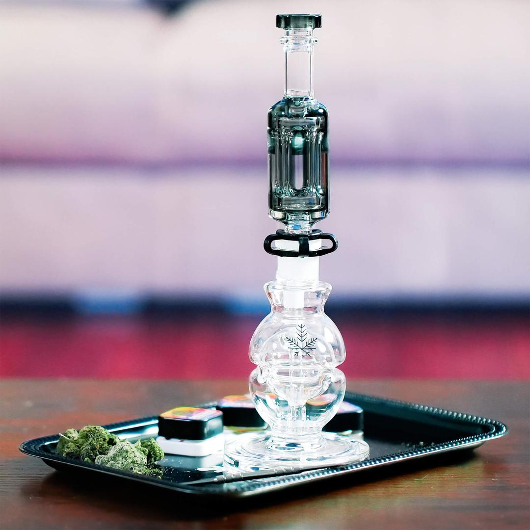 Freeze Pipe Mini Dab Rig with frozen glycerin coil on display tray, compact cooling water rig for smooth hits.