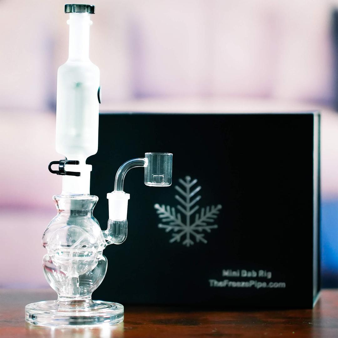 Freeze Pipe Mini Dab Rig with branded packaging, premium borosilicate glass and freezable coil for cool vapor.