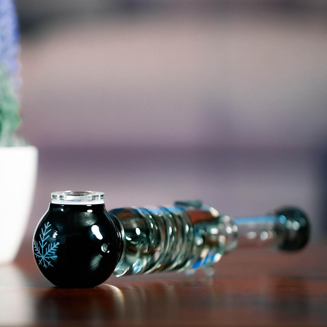 Close-up of Freeze Pipe on wood surface showcasing frozen glycerin coil chamber