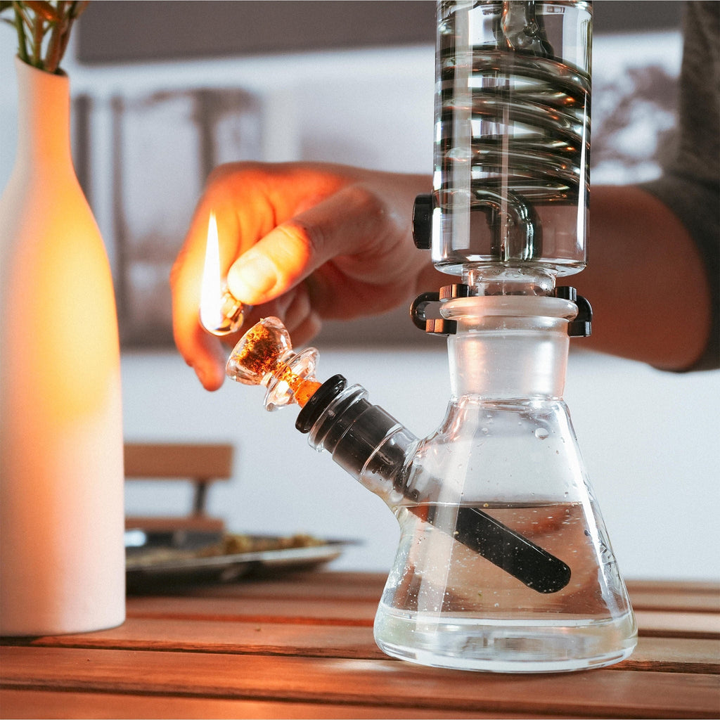 Freeze Pipe Beaker Bong in use showing frozen glycerin coil cooling system for smooth, chilled smoke