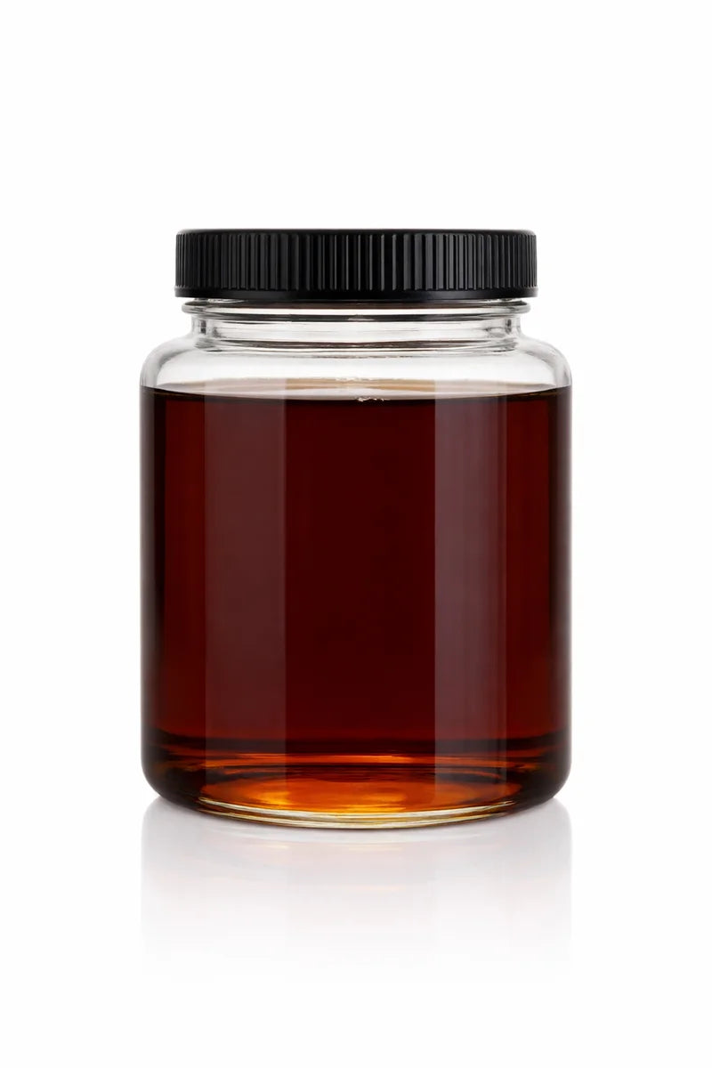 Full Spectrum Distillate, Hemp-Derived Cannabinoid Extract in a medium glass jar with black lid