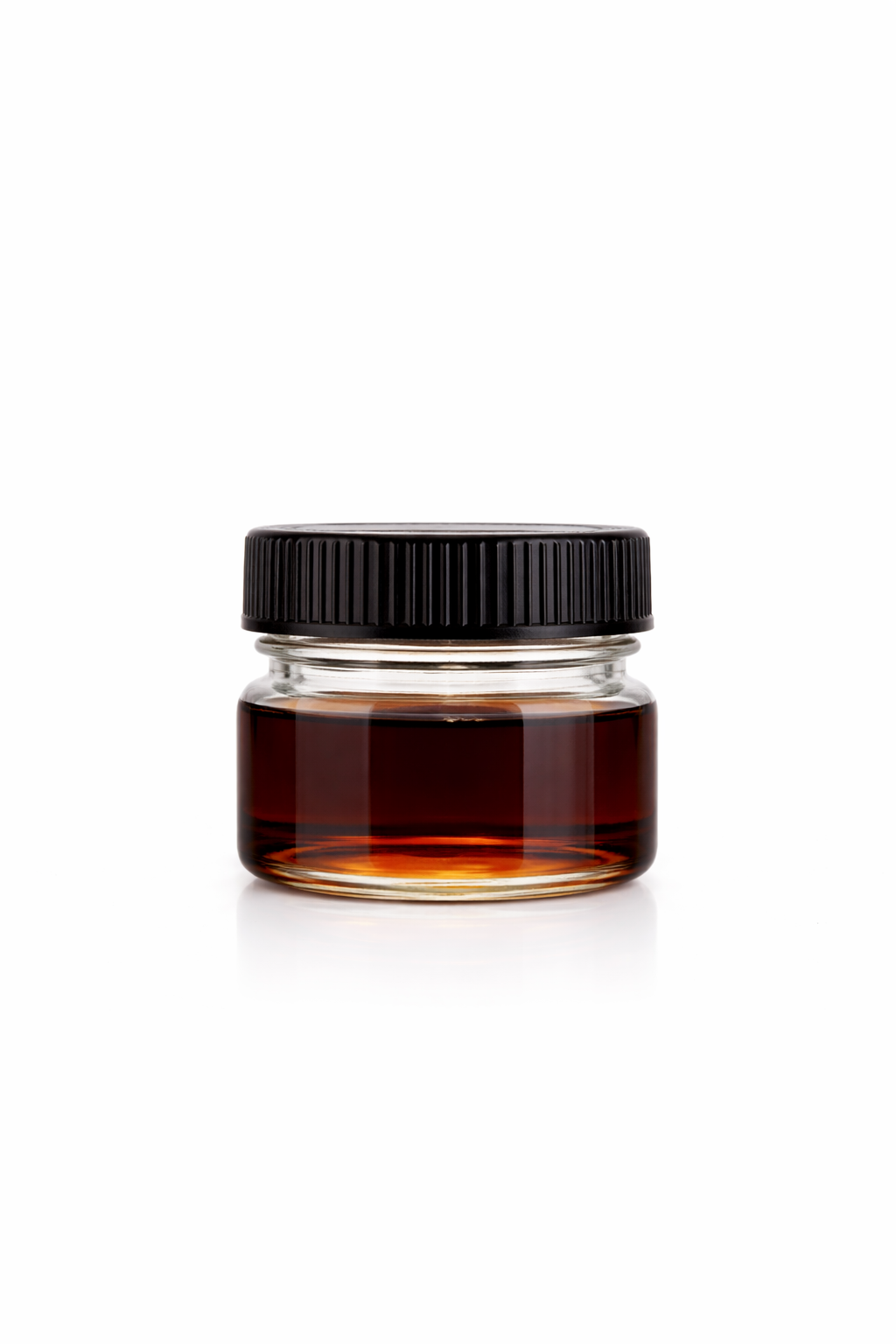 Full Spectrum Distillate, Hemp-Derived Cannabinoid Extract in a small glass jar with black lid