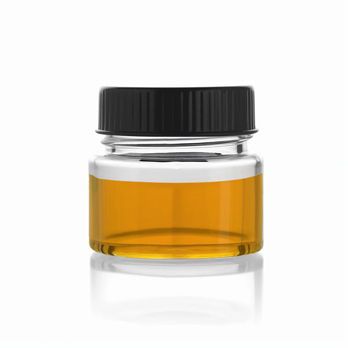 Glass jar of THC-O oil for relaxation and pain relief, offering bulk CBD, CBN, CBT, CBG, and bulk THC benefits.