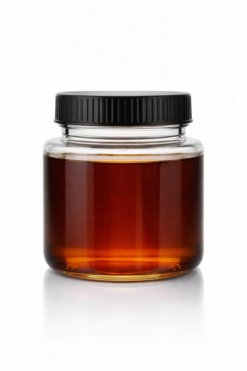 Jar of THCv distillate used for research, formulation, and product development.